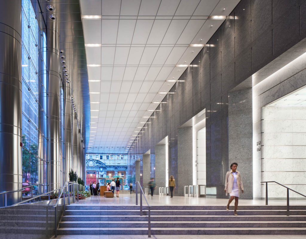 One North Wacker by 50,000feet, lobby with a long granite colonnade beside the glass street wall, Chicago