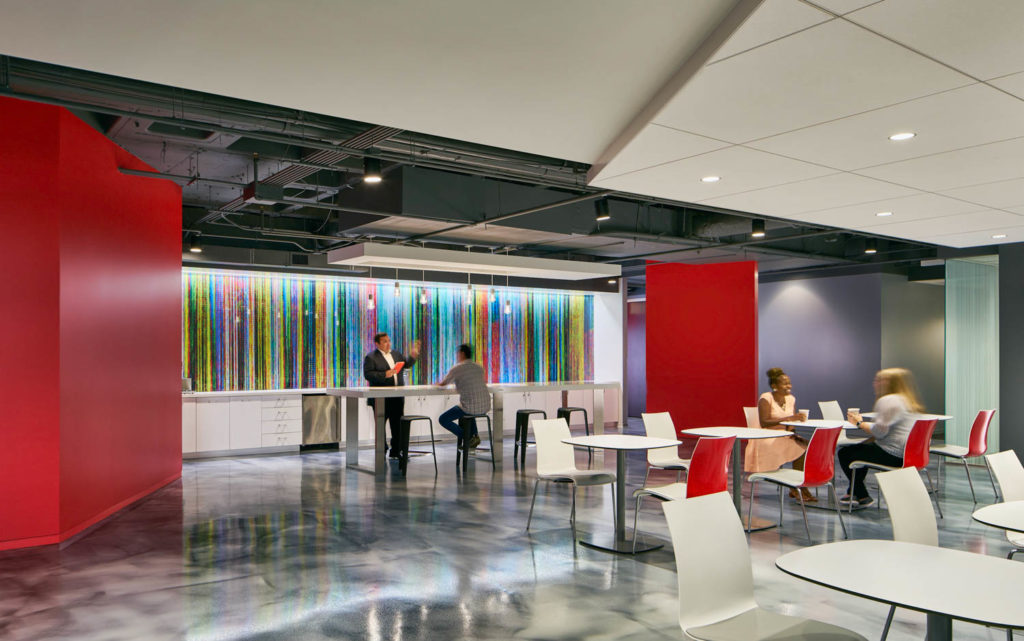 Comcast by CannonDesign, café with a colorful glass wall and red columns, Chicago