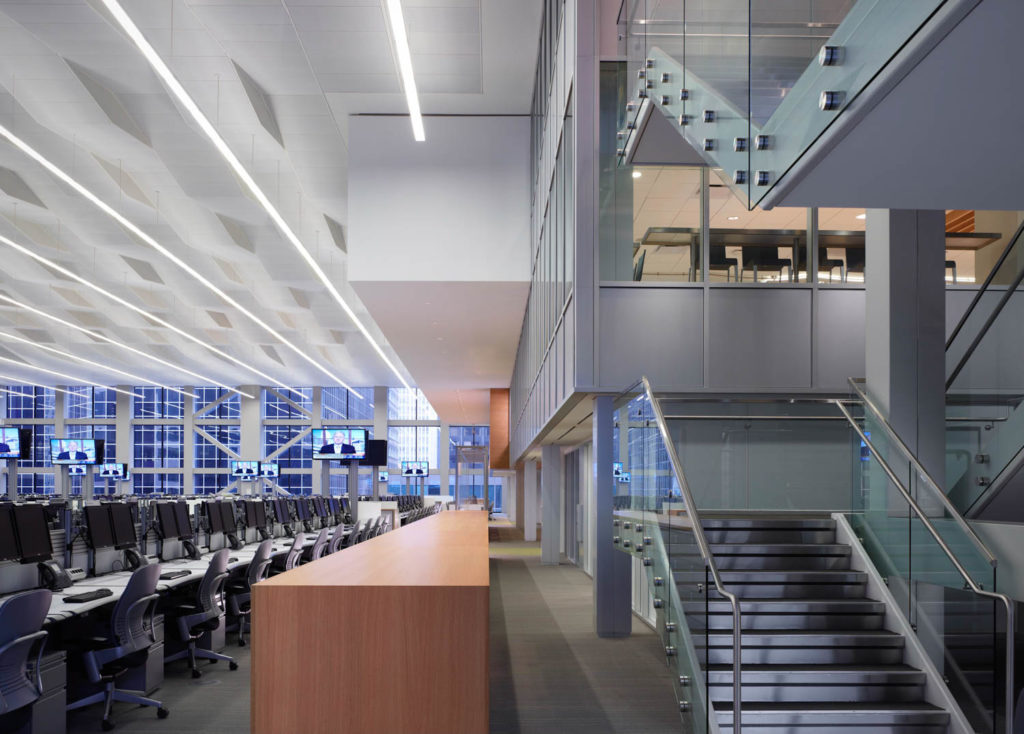 BP by Gensler, glass-walled communicating stair beside a trading floor, Chicago
