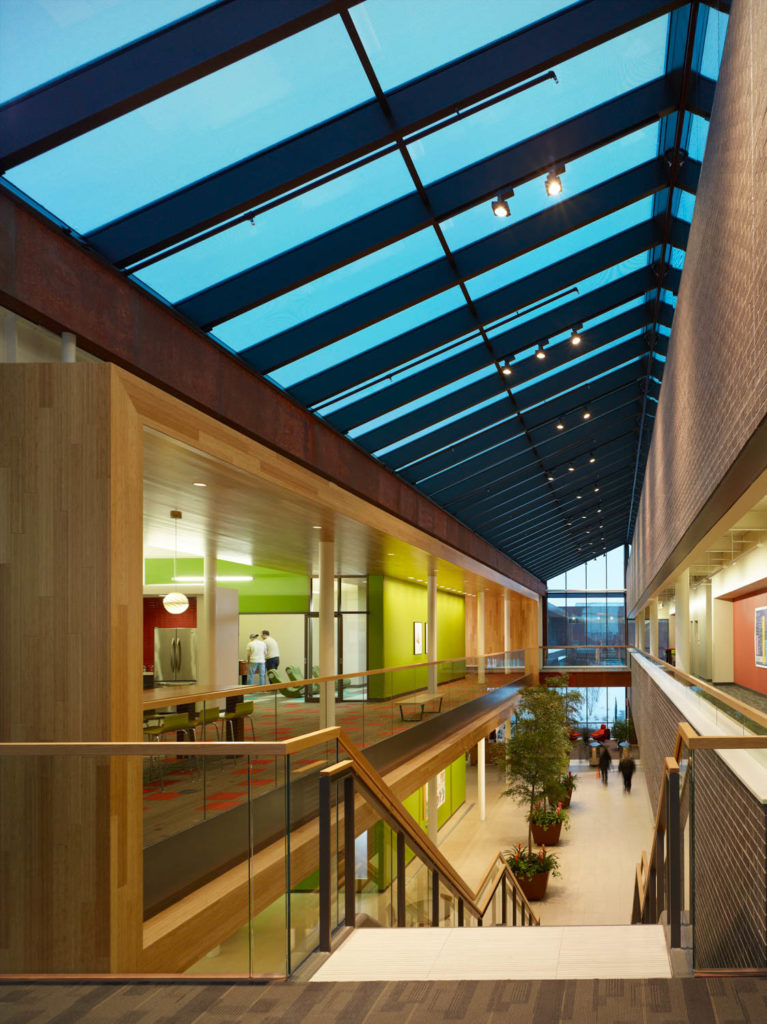 Microsoft by Perkins+Will, skylit atrium with bridges and colorful offices, Fargo