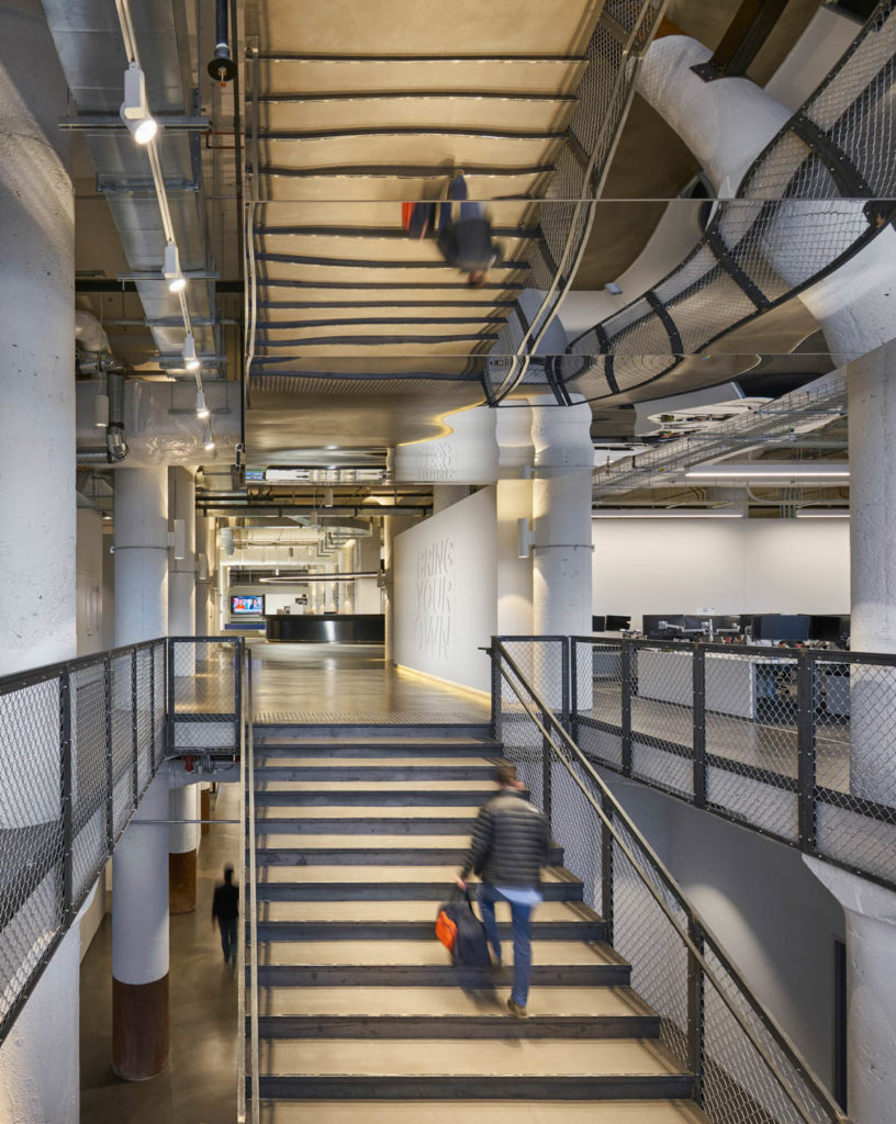 Echo Global Logistics by CannonDesign, industrial stair connecting two office floors, Chicago