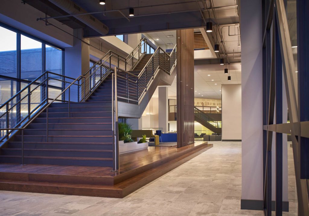 U.S. Cellular by Whitney Architects, wide stair rising through a multistory office, Chicago