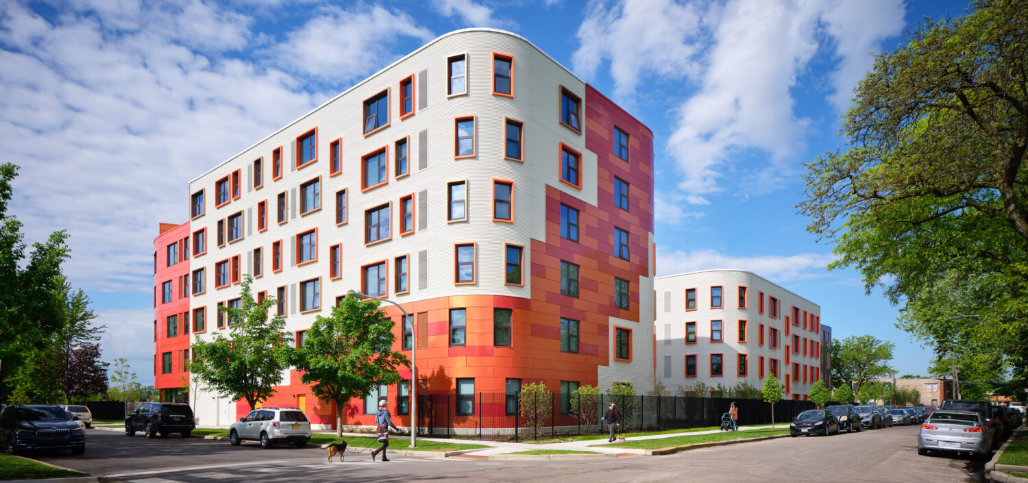 Encuentro Square by Canopy, a six-story affordable housing building with orange and white facades in Logan Square, Chicago