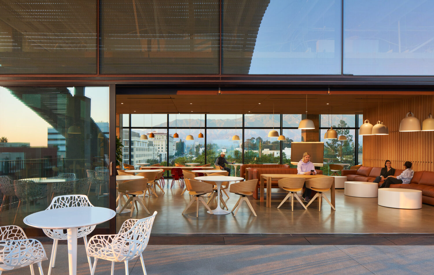 Kaiser Permanente Bernard J. Tyson School of Medicine by Yazdani Studio of CannonDesign, café seating opening to a courtyard, Pasadena
