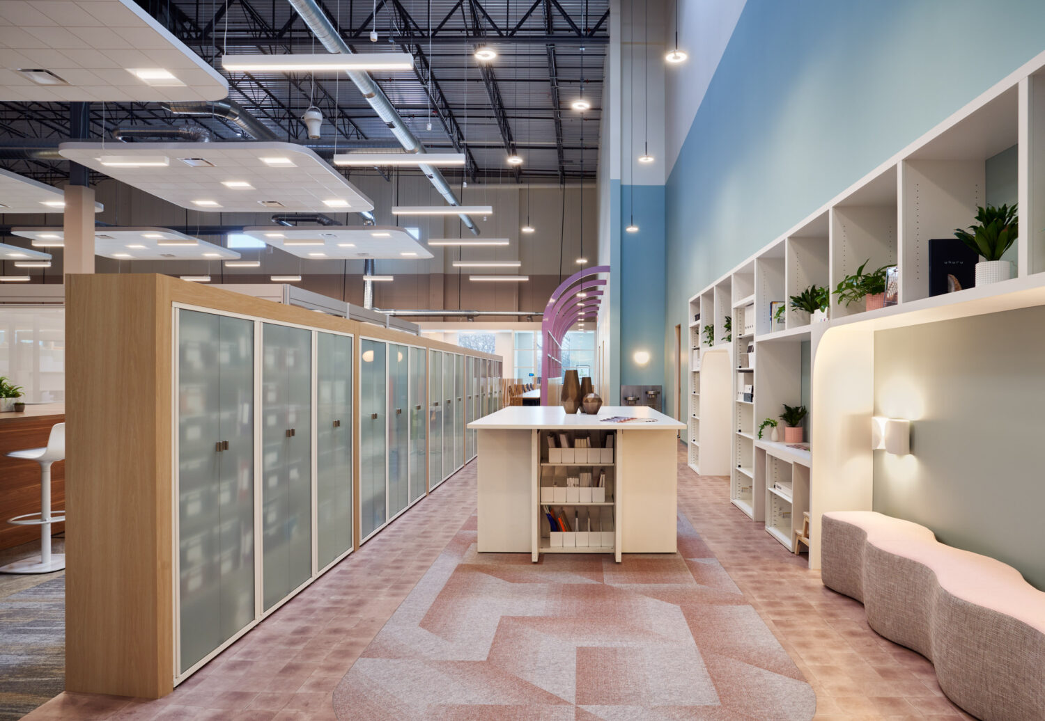 Corridor of frosted storage lockers and arched shelving along a blue wall at Forward Space
